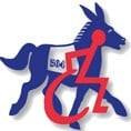 The 504 Democratic Club
	  logo; Blue Donkey with Red Wheelchair User in foreground