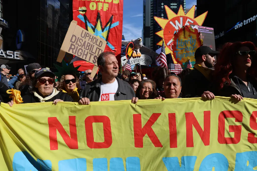Front of New york City no kings rally with 504 Dems president Mike Schweinsburg and City Comptroller Brad Lander holding the banner